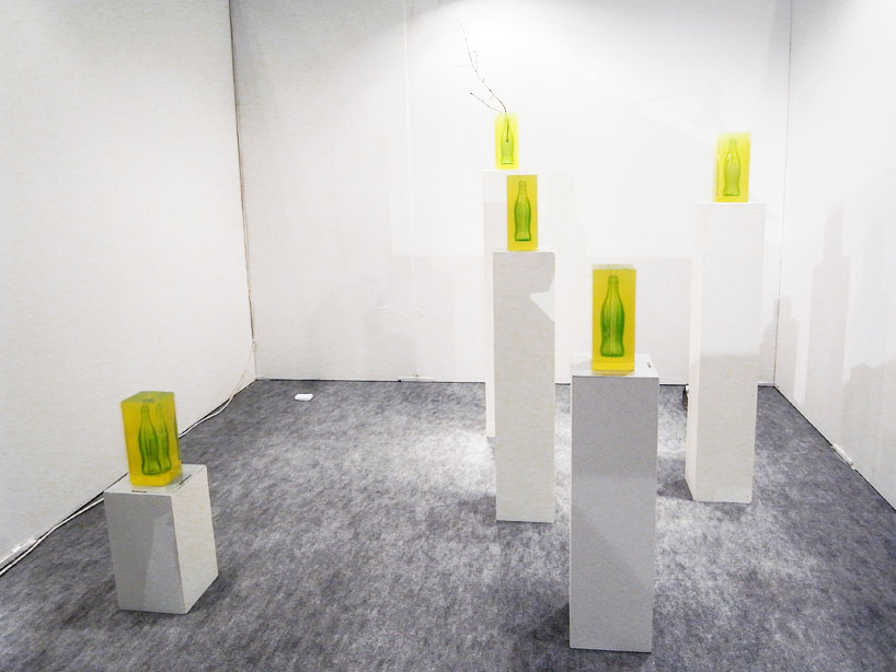 jaeuk jung: coca cola bottle in amber like polymer