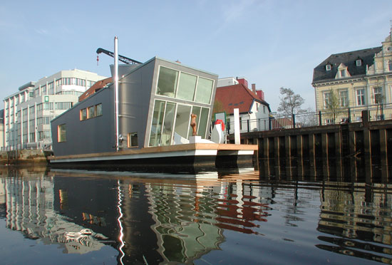schwimmhausboot: the 'silver fish', floating house