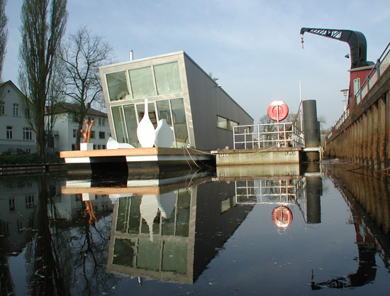 schwimmhausboot: the 'silver fish', floating house