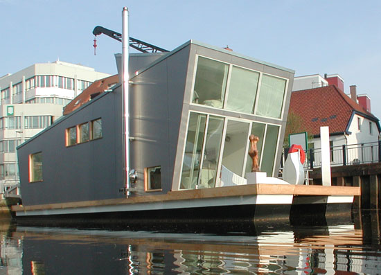 schwimmhausboot: the 'silver fish', floating house
