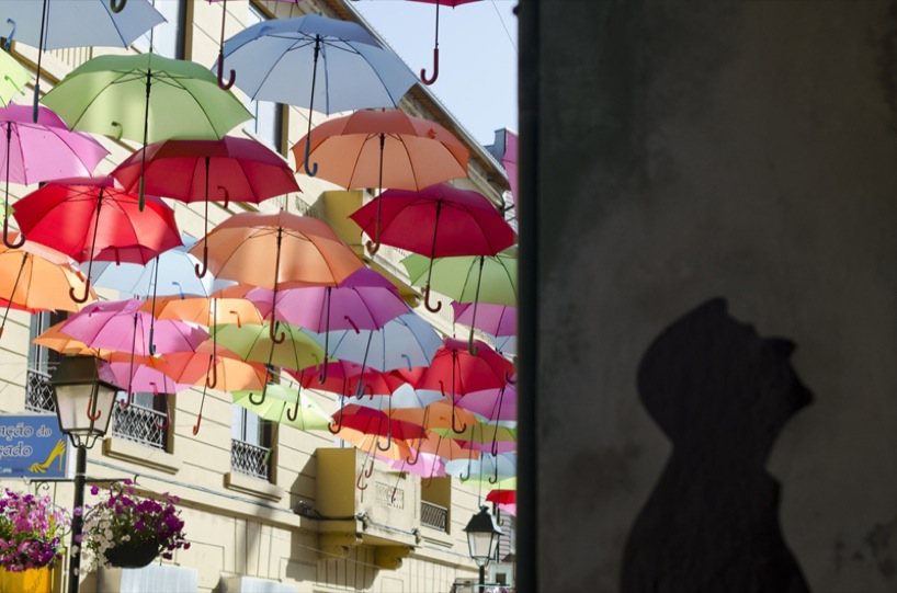 ivotavares studio: colorful umbrellas installation