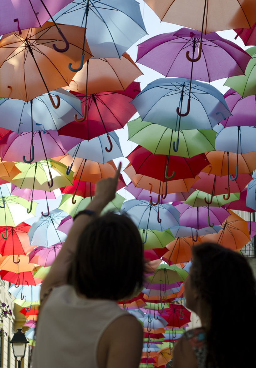 ivotavares studio: colorful umbrellas installation