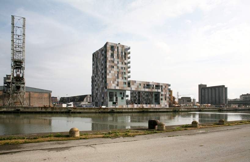 zucchi & partners: ravenna harbour apartment building