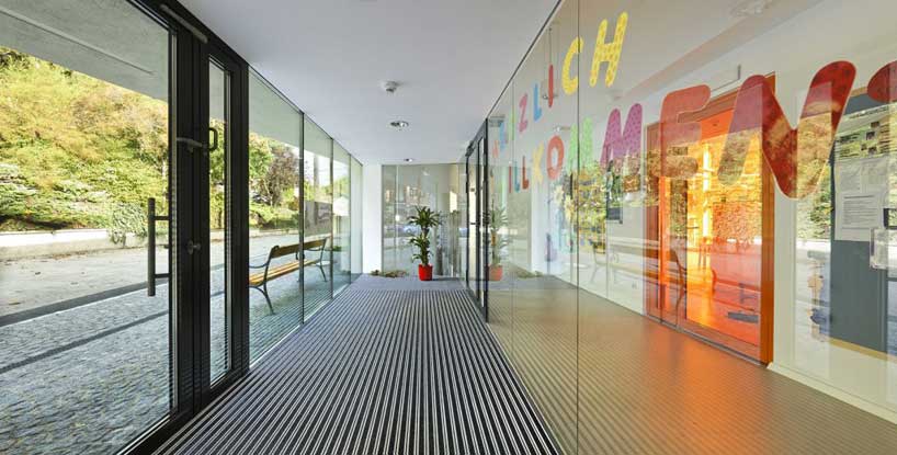 syntax architektur: kindergarten in holzbauweise
