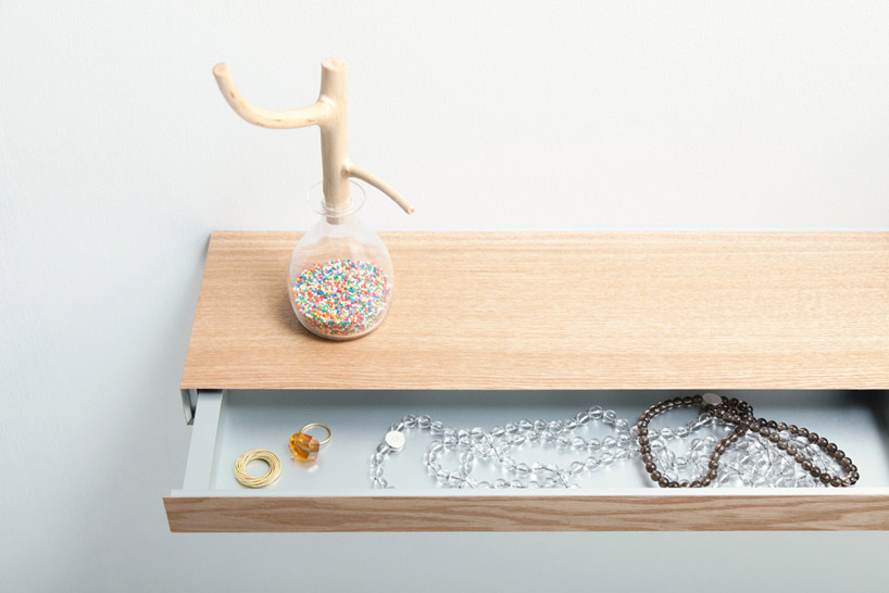 clopen shelf doubles as a secret drawer by torafu architects