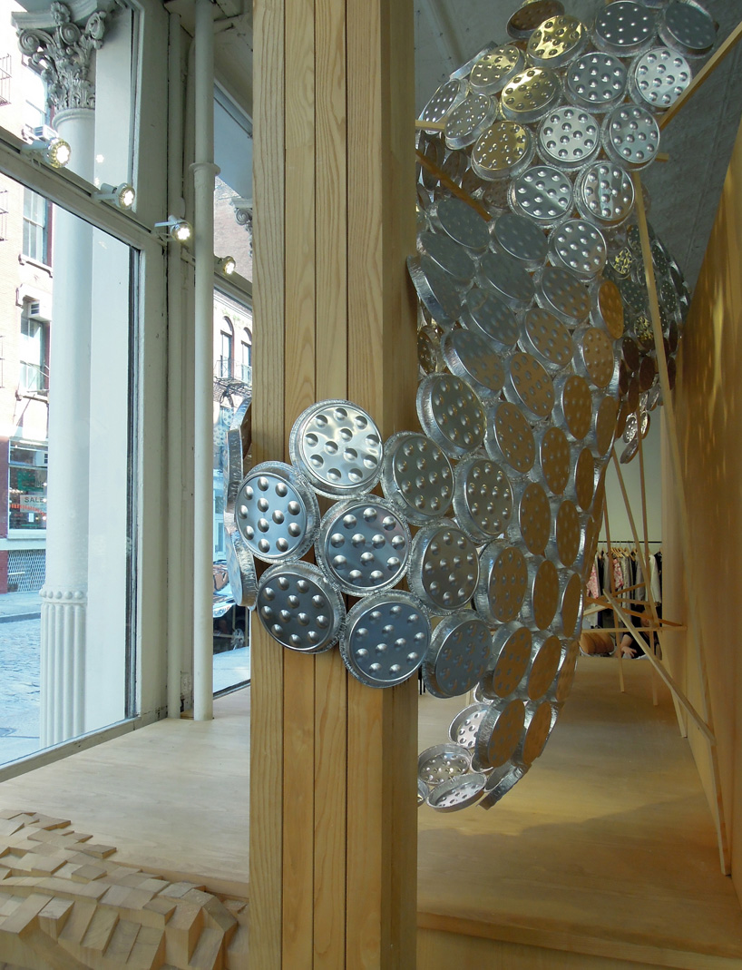 arnold goron: aluminum snail plate installation for isabel marant