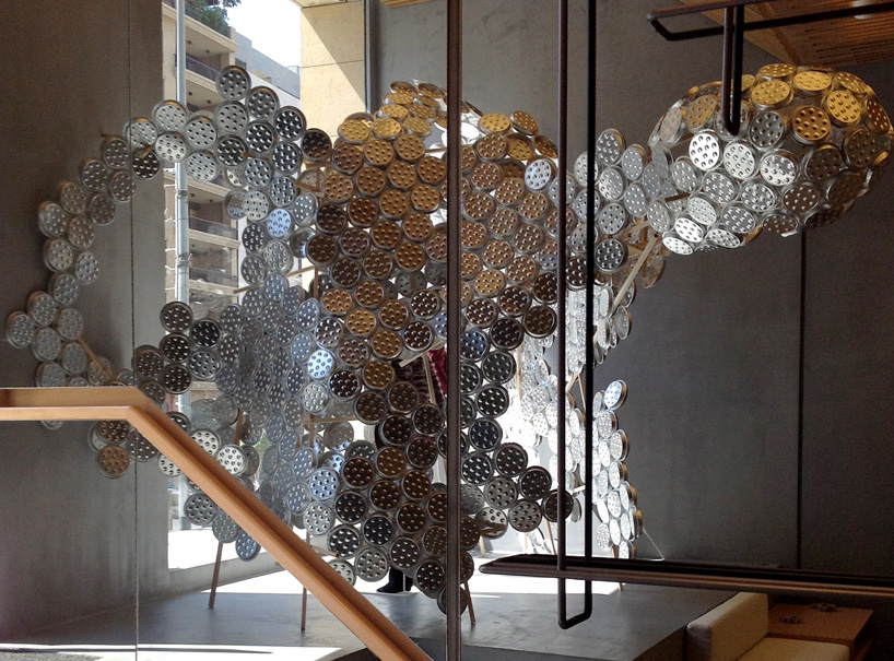 arnold goron: aluminum snail plate installation for isabel marant