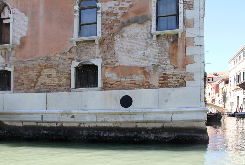 richard goodwin puts black dots on vacant buildings in venice