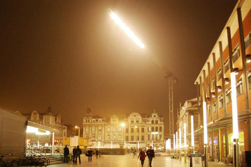 pivoting crane lamp by gijs van vaerenbergh creates 'skylight' in belgium