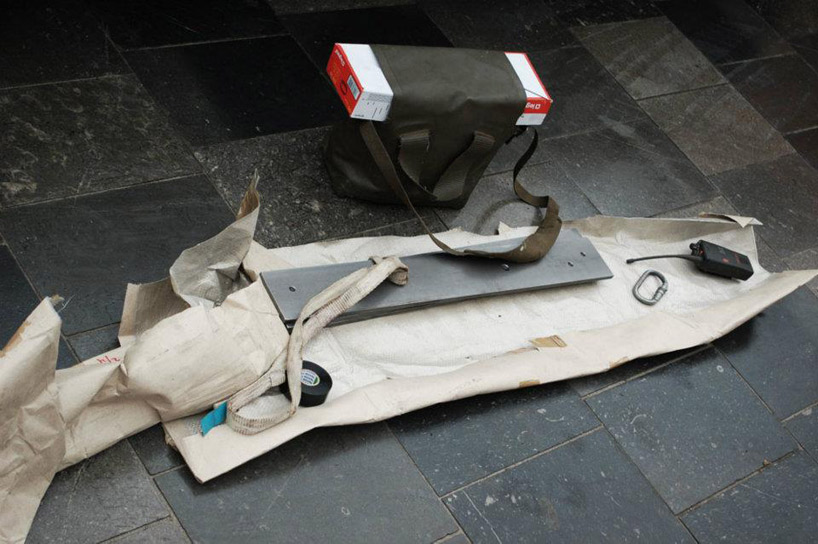 pivoting crane lamp by gijs van vaerenbergh creates 'skylight' in belgium