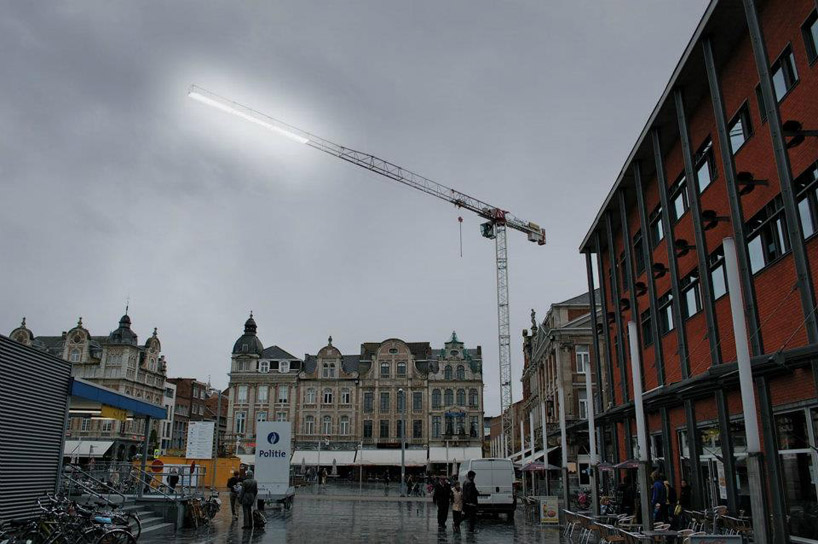 pivoting crane lamp by gijs van vaerenbergh creates 'skylight' in belgium