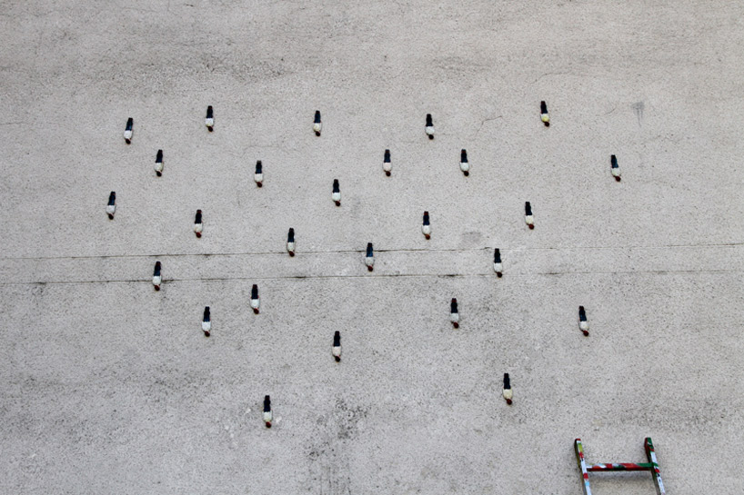 new cement eclipse installations by isaac cordal
