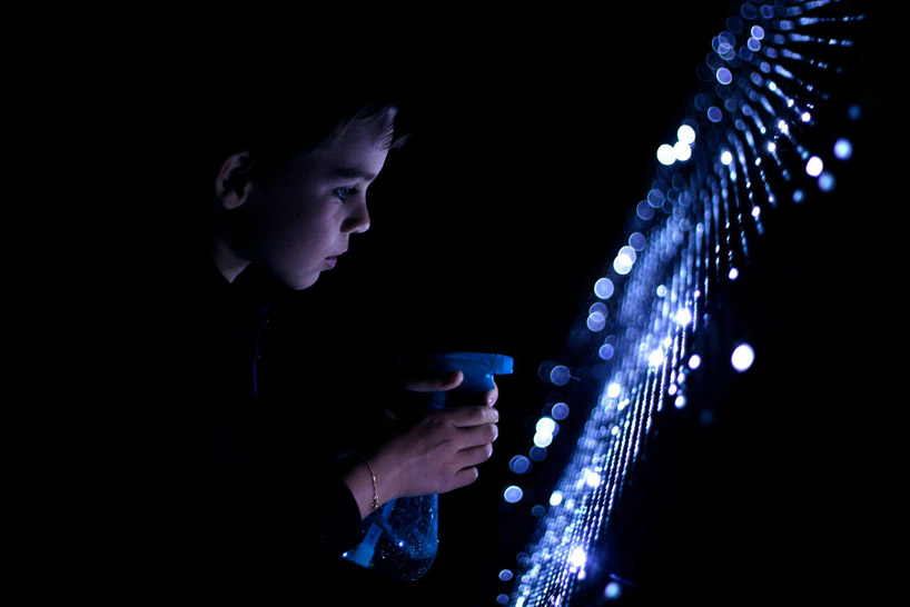 interactive water light graffiti wall installation by antonin fourneau