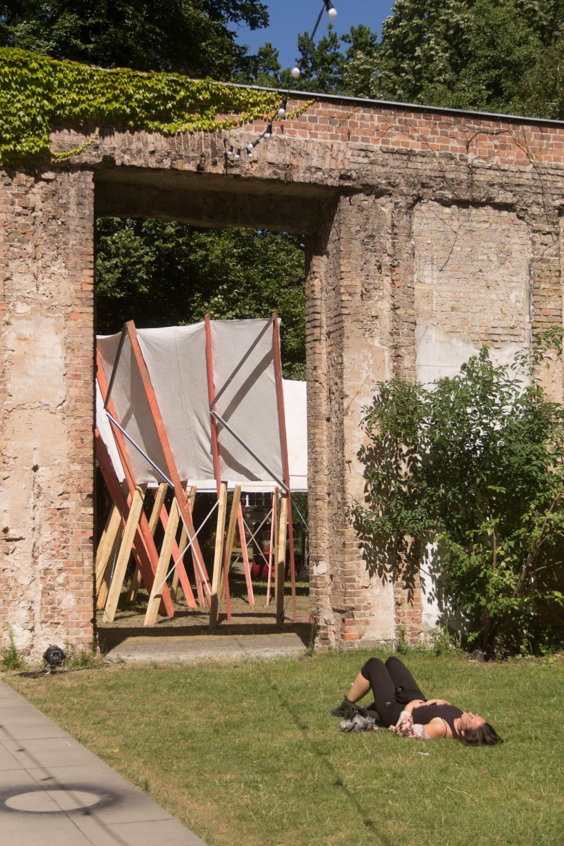 salvaged construction waste shapes material circle pavilion in berlin