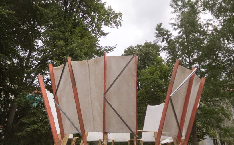 salvaged construction waste shapes material circle pavilion in berlin