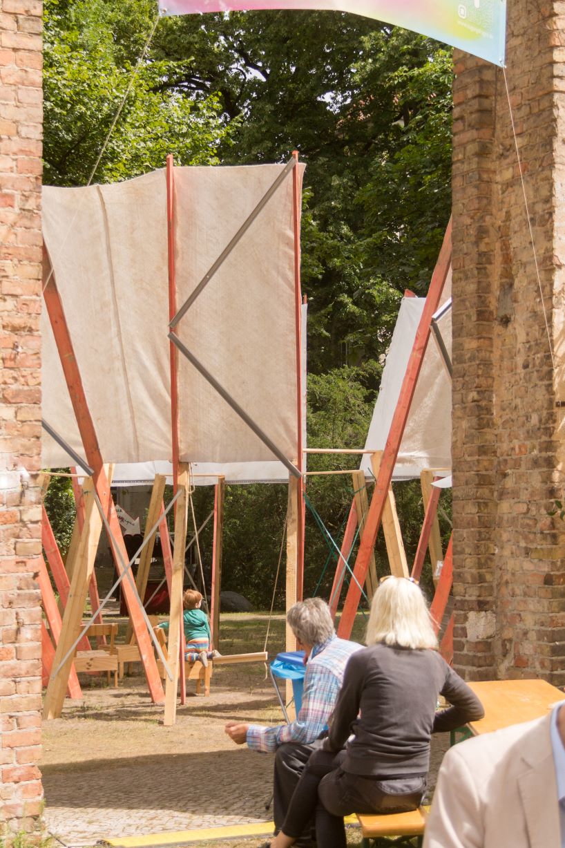 salvaged construction waste shapes material circle pavilion in berlin