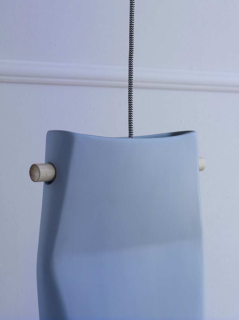 skrivo reinterprets clay throwing processes to create asymmetrical-shaped lamps skrivo dent lamp miniforms designboom