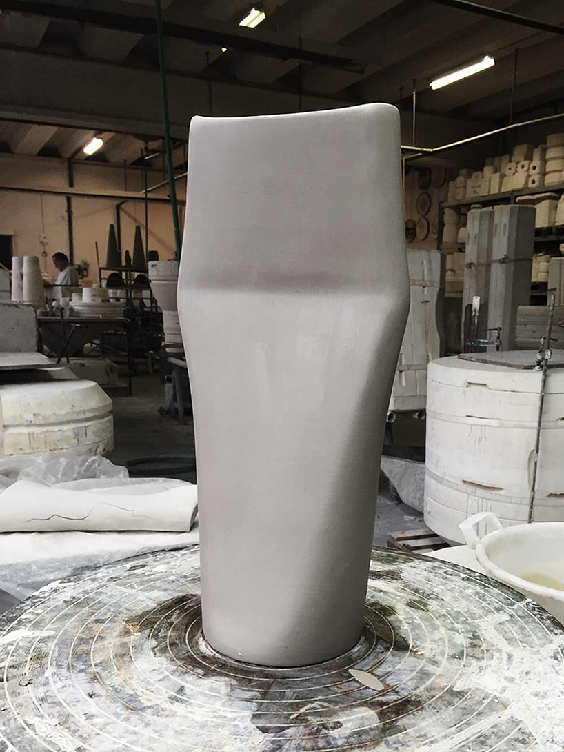 skrivo reinterprets clay throwing processes to create asymmetrical-shaped lamps skrivo dent lamp miniforms designboom