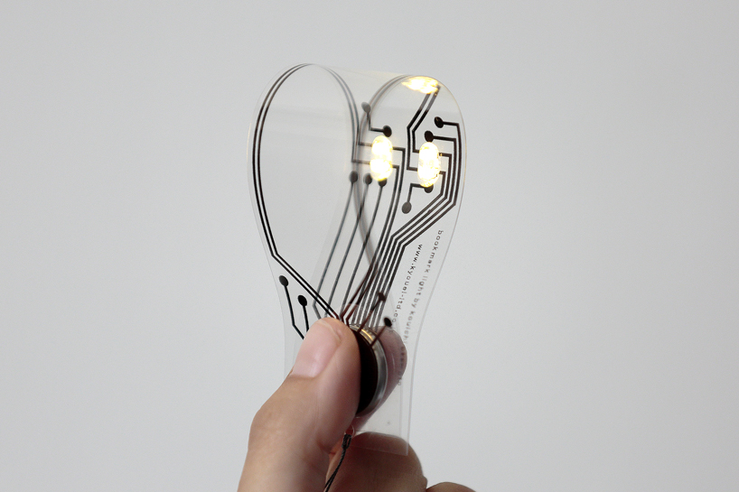 kouichi okamoto's bookmark light is transformed through the click of a button