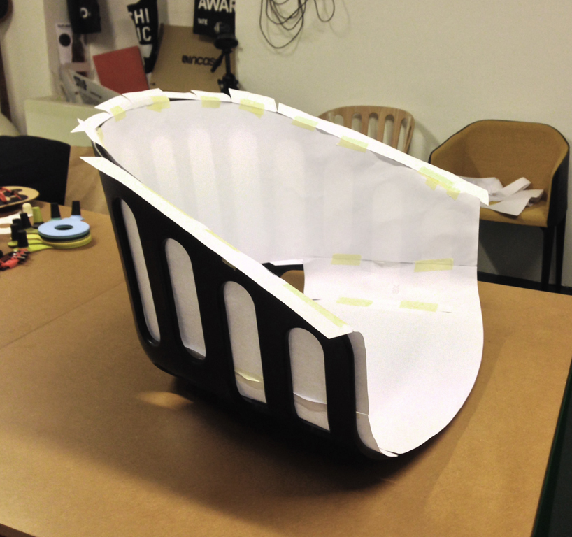 alessandro busana designs rattan-container inspired chair for gaber