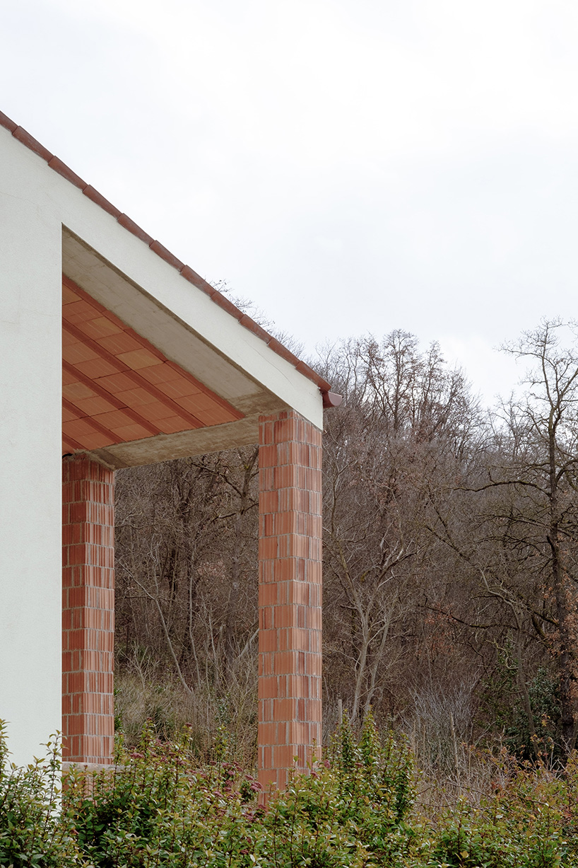 exposed materials animate textured decorative patterns within rural house in italy