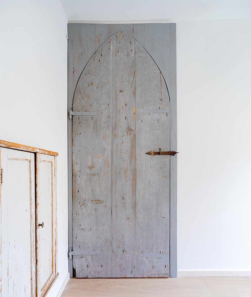 exposed materials animate textured decorative patterns within rural house in italy