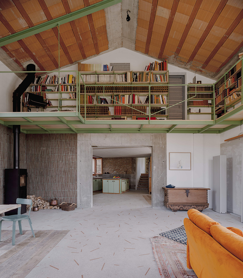 exposed materials animate textured decorative patterns within rural house in italy