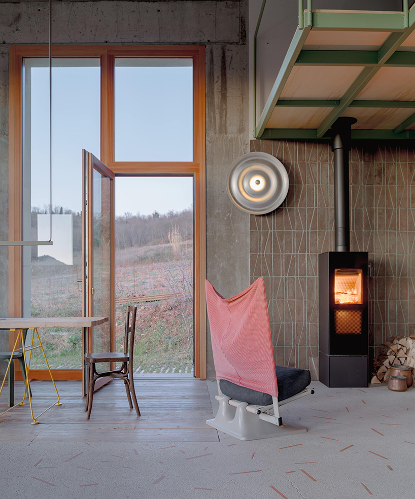 exposed materials animate textured decorative patterns within rural house in italy