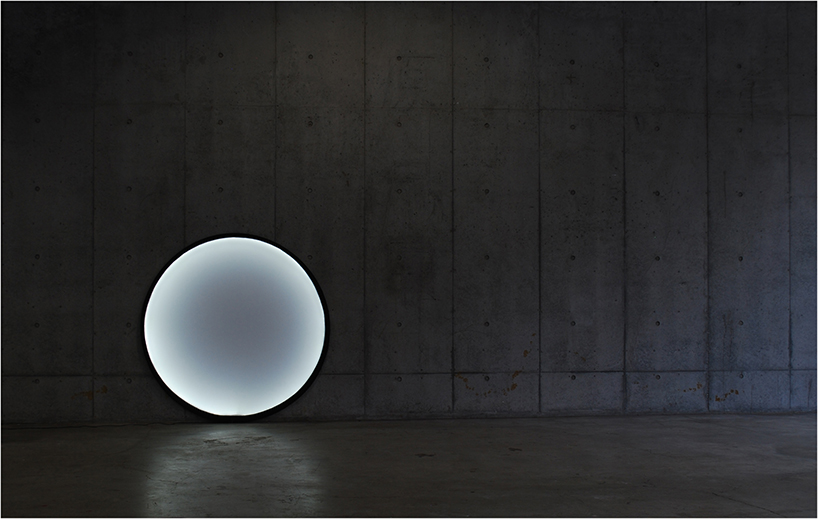 kazuhiro yamanaka's collapsible moon lamp unfolds like photo-reflectors