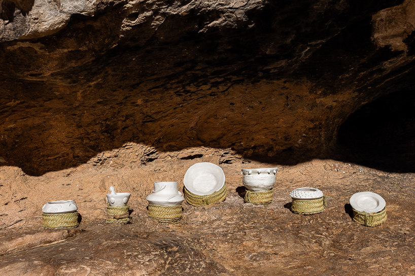 jorge mañes rubio's ceramic vessels pose a ritual offering at a prehistoric cave in spain