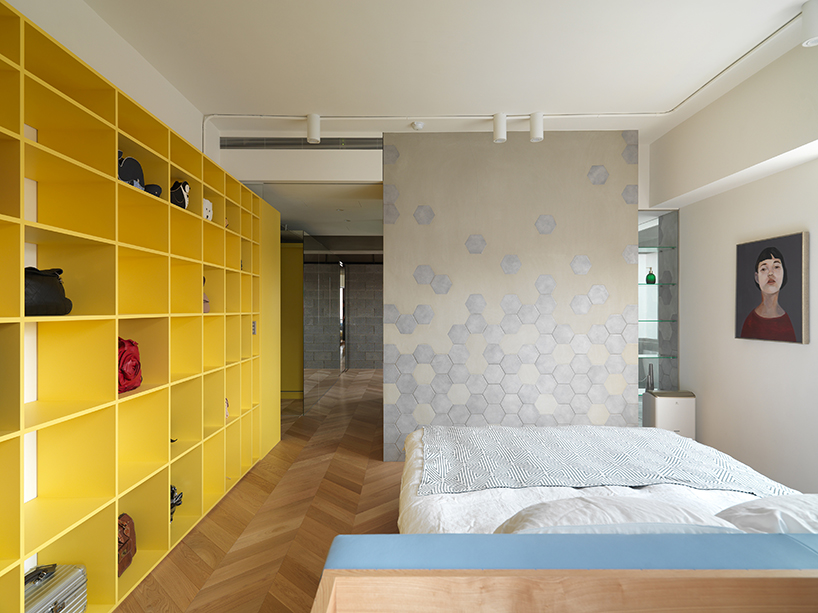 KC design studio divides taiwanese residence into private + public spheres