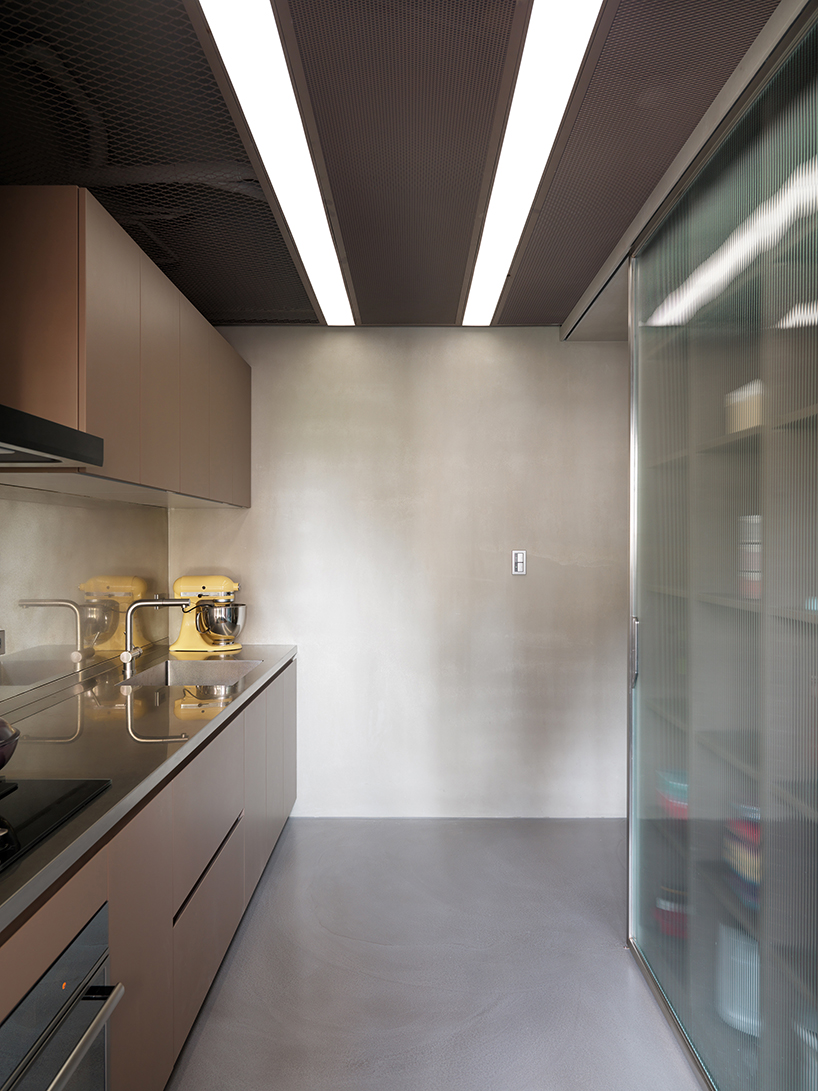 KC design studio divides taiwanese residence into private + public spheres
