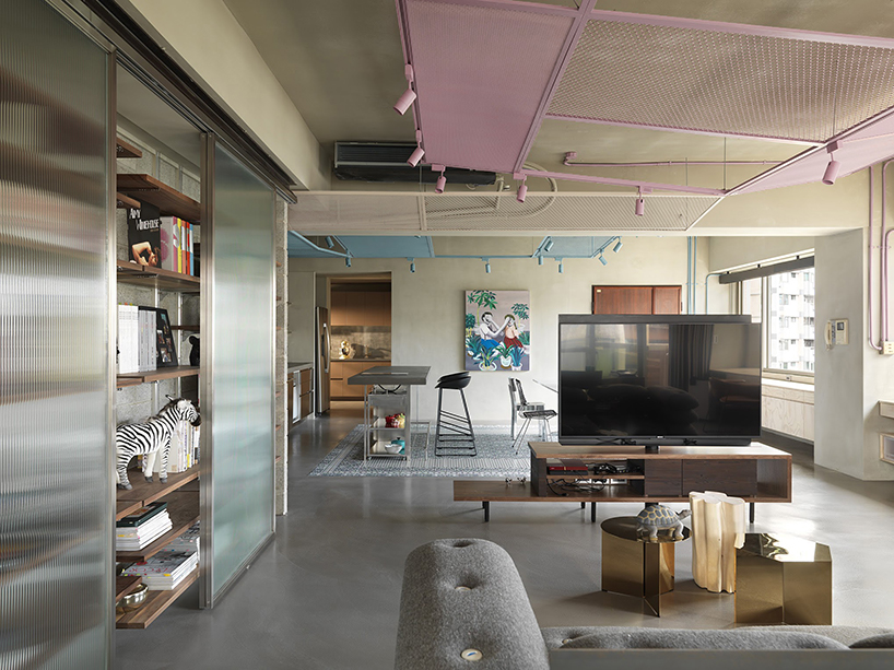 KC design studio divides taiwanese residence into private + public spheres