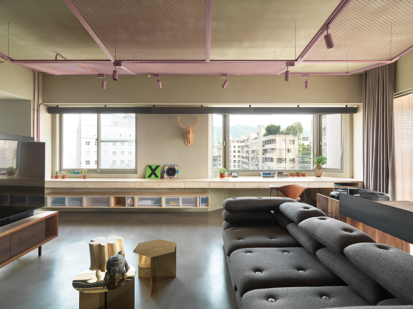 KC design studio divides taiwanese residence into private + public spheres