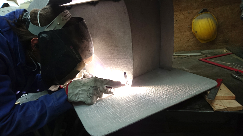 the tiss tiss chair uses a welding technique that evokes the appearance of textured denim