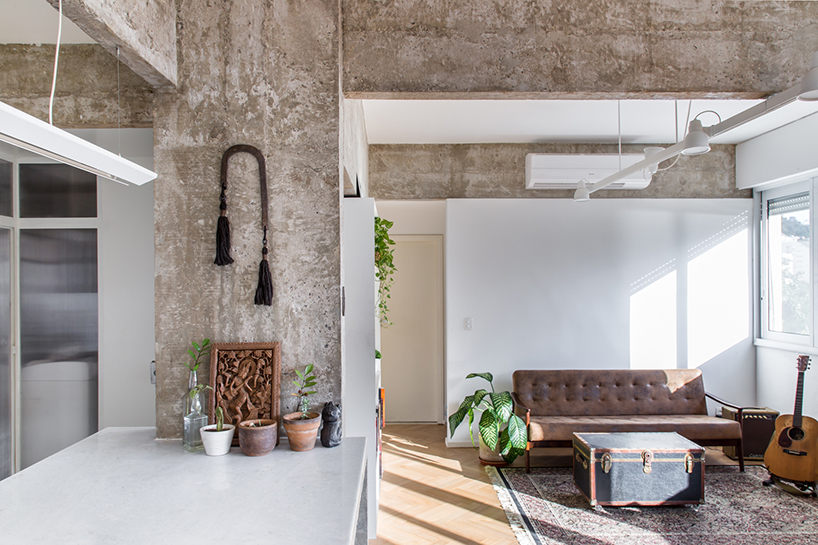 rodrigo bocater renovates 1960’s concrete apartment into musician’s home in rio de janeiro