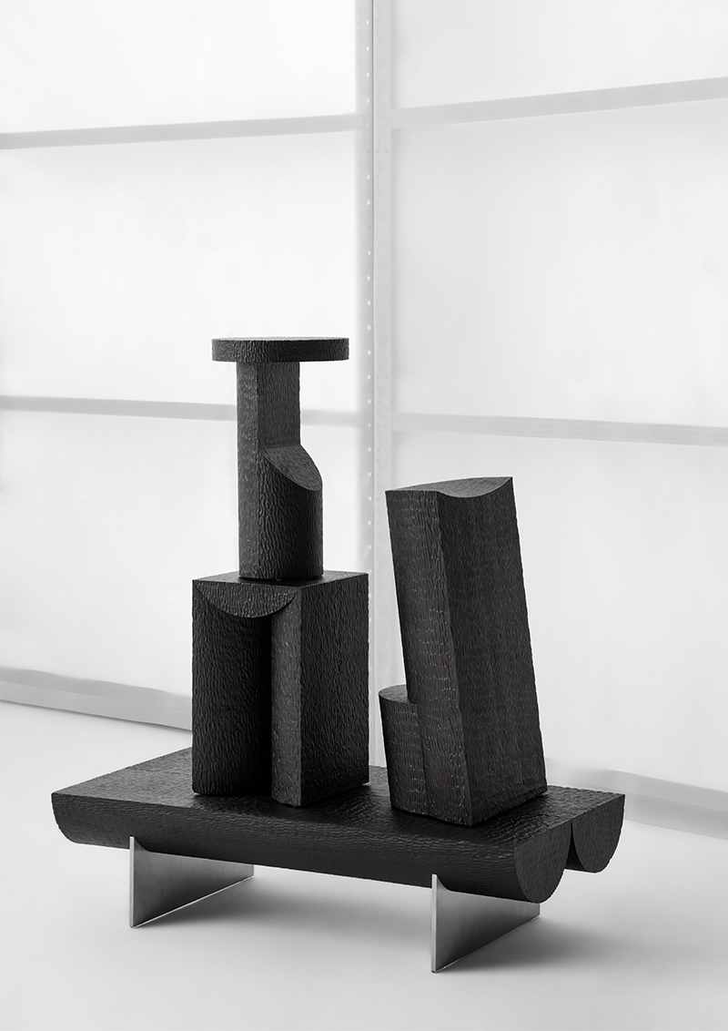 monolithic stools by ren hongfei embrace organic semi-cylindrical forms and raw textures of wood logs