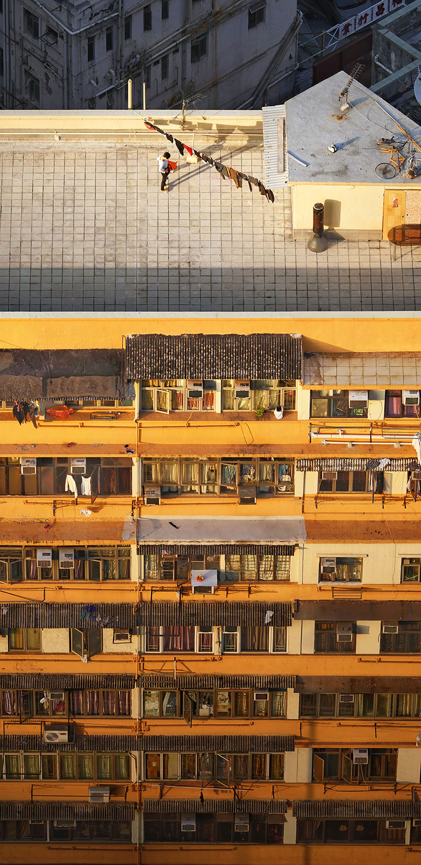 romain jacquet-lagrèze captures hong kong’s rooftops in new photo series