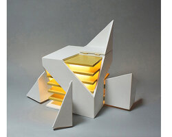 interactive foldable cube lamp swings open and emits warm light from multiple corners