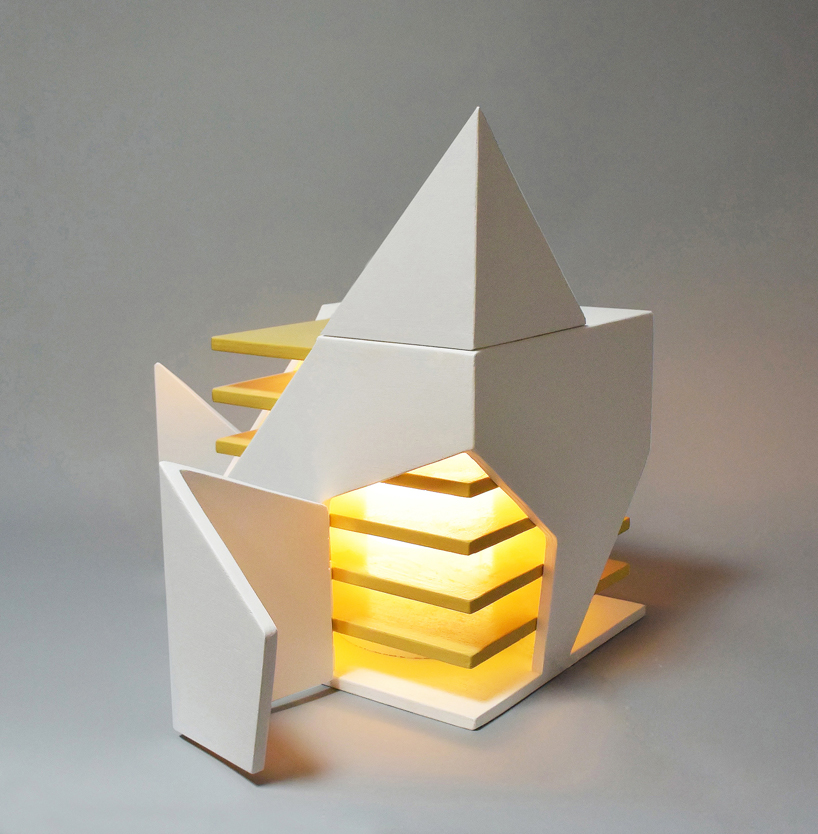 the lighting piece is made of painted wood