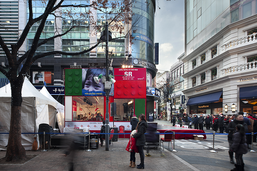 studio_GAON designs red cross cube pavilion as LEGO block