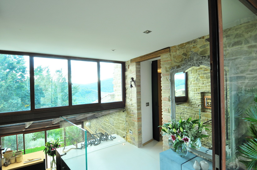 nico van der meulen renovates a 12th century stone guardhouse in italy