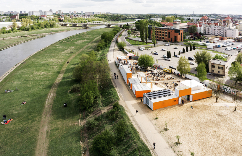 adam wiercinski transforms shipping containers into art city