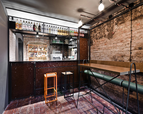 adam wiercinski refurbishes polish whiskey bar zrodlo
