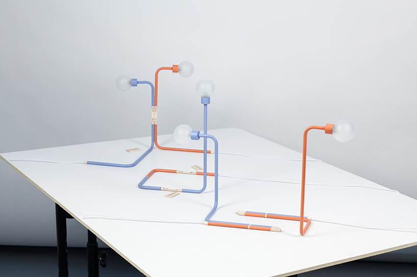  a play of dependencies table lamp designboom