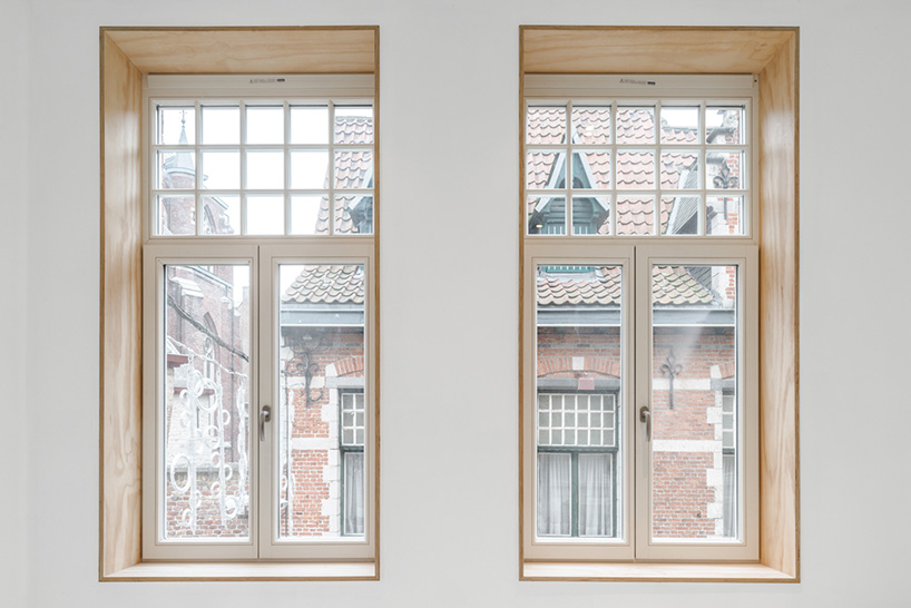 cnockaert architecture turns a medieval structure into a modern residence