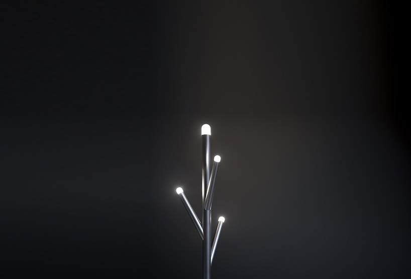 dorodesign illuminates stand branches on lucciola fireflies
