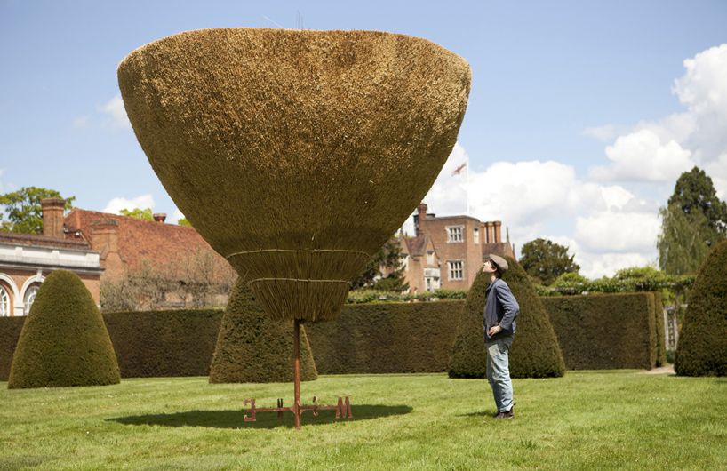 17 foot high inverted thatched roof sculpture