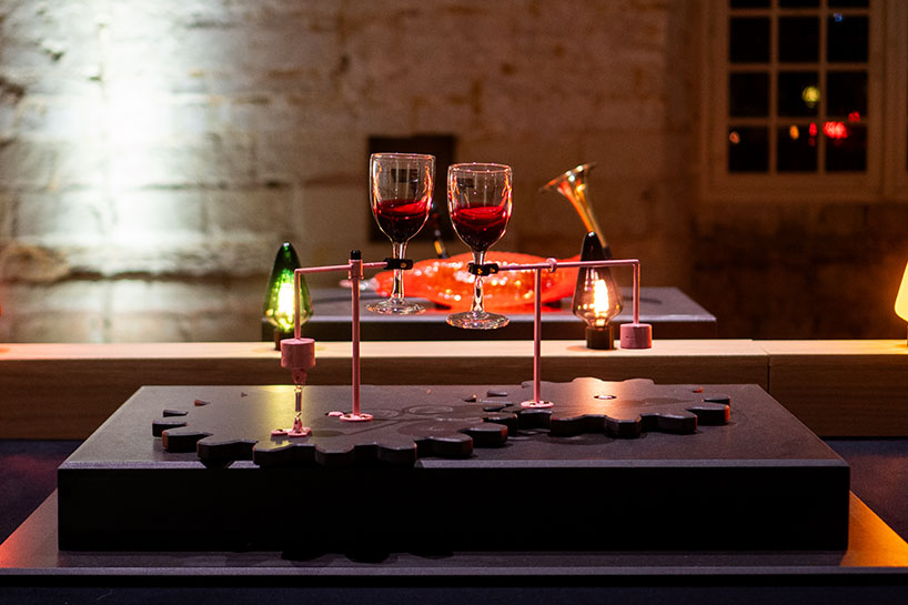 sensory machines of glass, light and sound animate 20-meter interactive christmas table