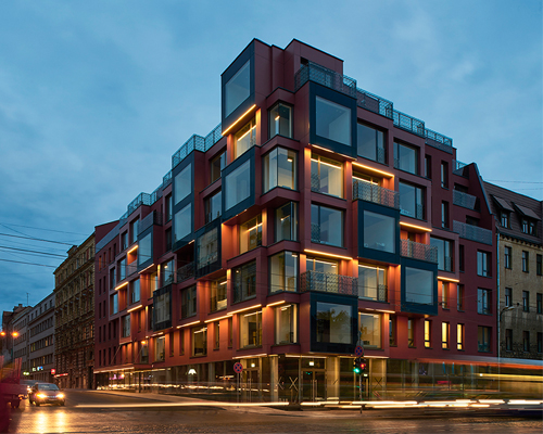 NRJA's apartment hotel in riga is punctuated by pixelated glass panels